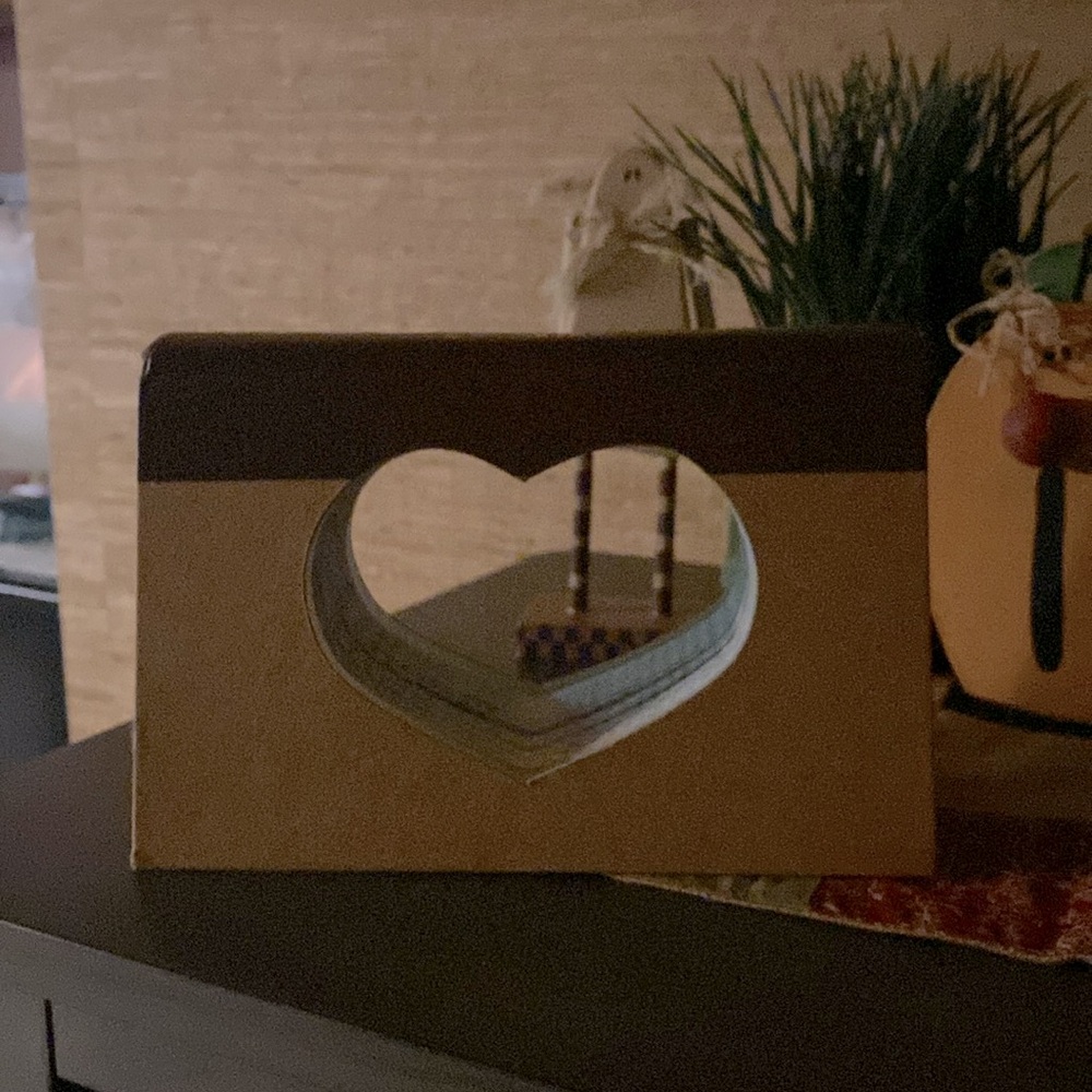 It’s a book with a heart cut into it.